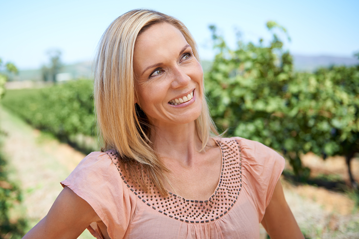 Woman with smooth, youthful skin after Restylane treatment in Oklahoma City to restore facial volume and soften wrinkles.