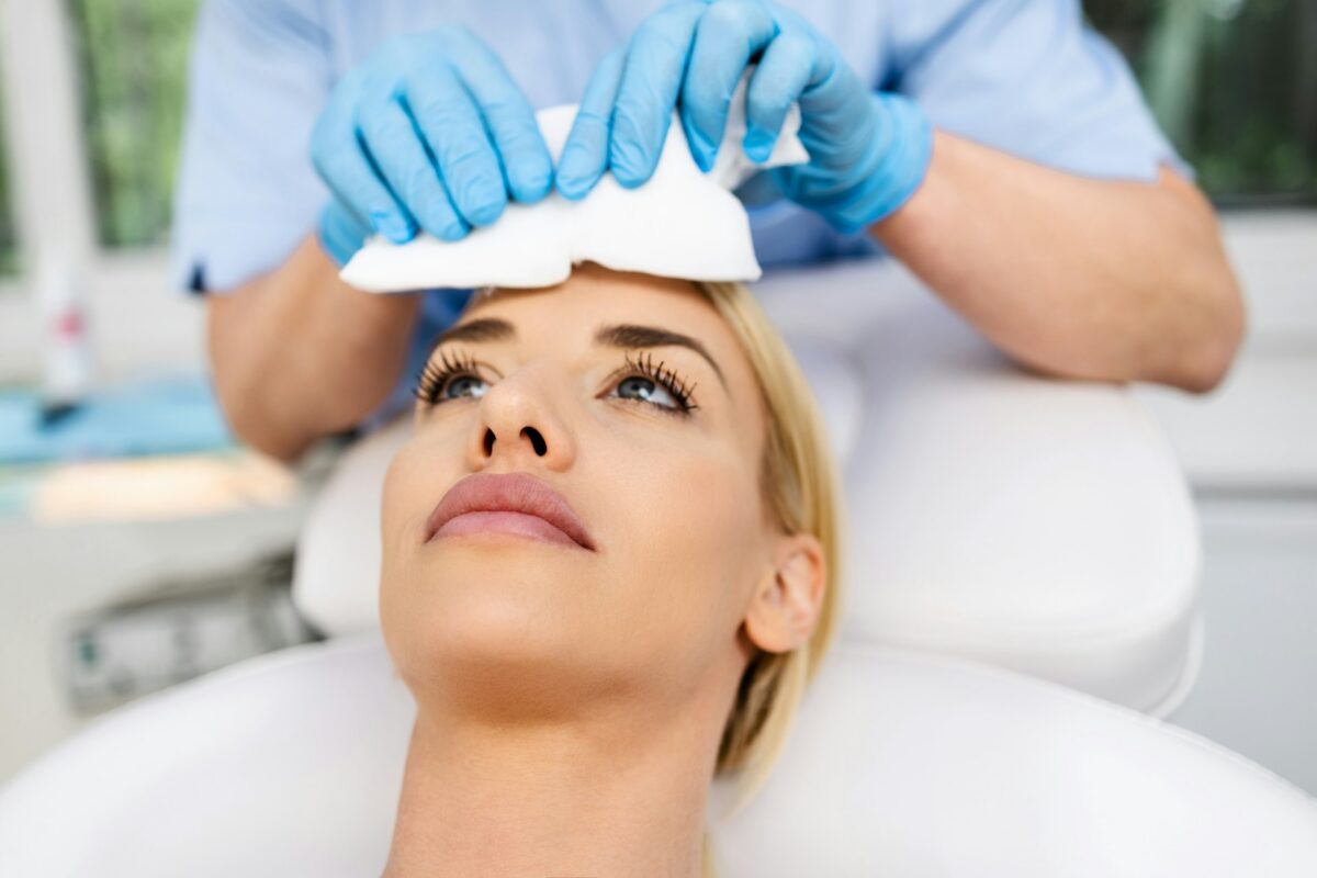 Patient preparing for a SkinPen microneedling treatment during the colder months to improve skin texture and tone.